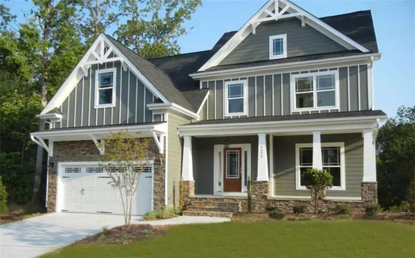 front view of a house with a yard