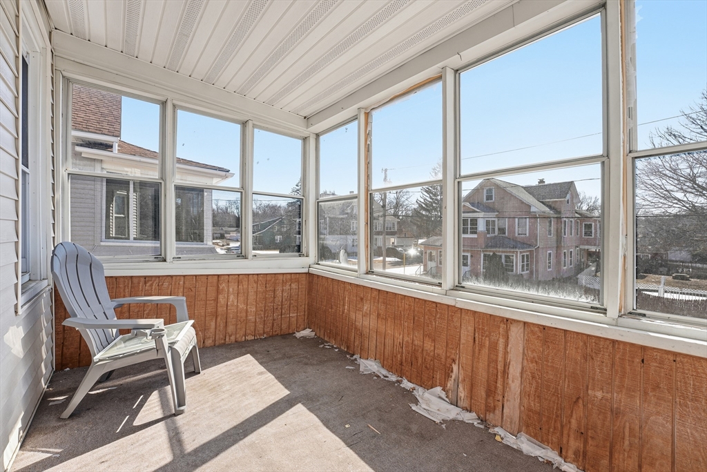 104-106 Madison Street Chicopee, MA 01020 - Photo 20 of 42 a room with a large window and table