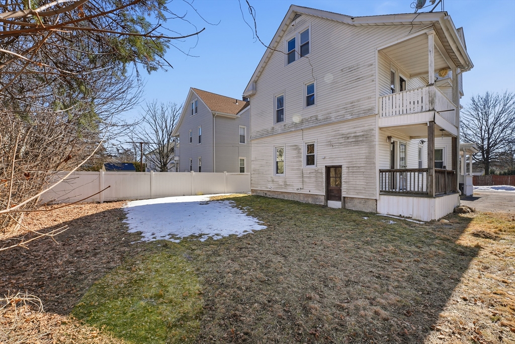 104-106 Madison Street Chicopee, MA 01020 - Photo 35 of 42 a view of a house with a yard