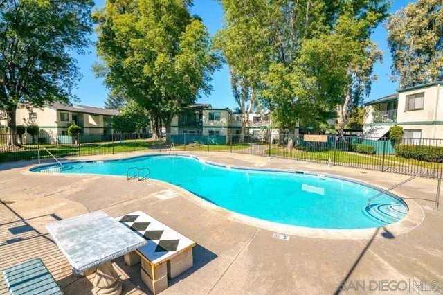 a view of a house with swimming pool