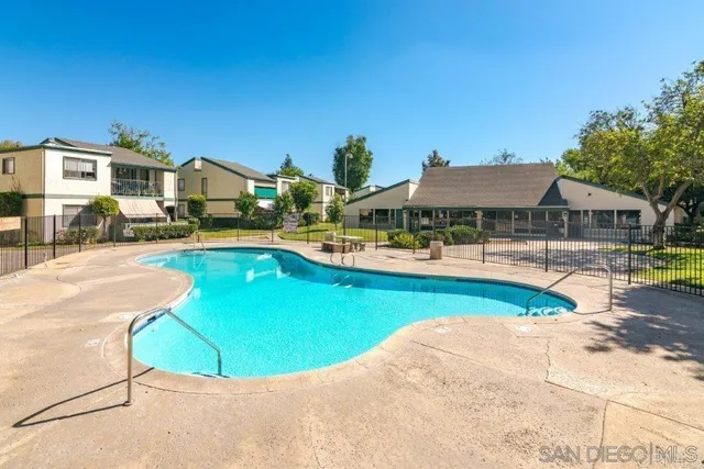 a view of swimming pool from a balcony