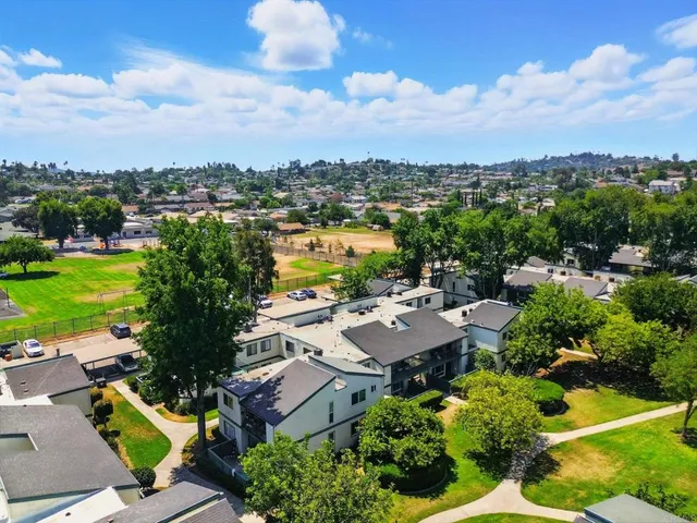an aerial view of a house with a garden
