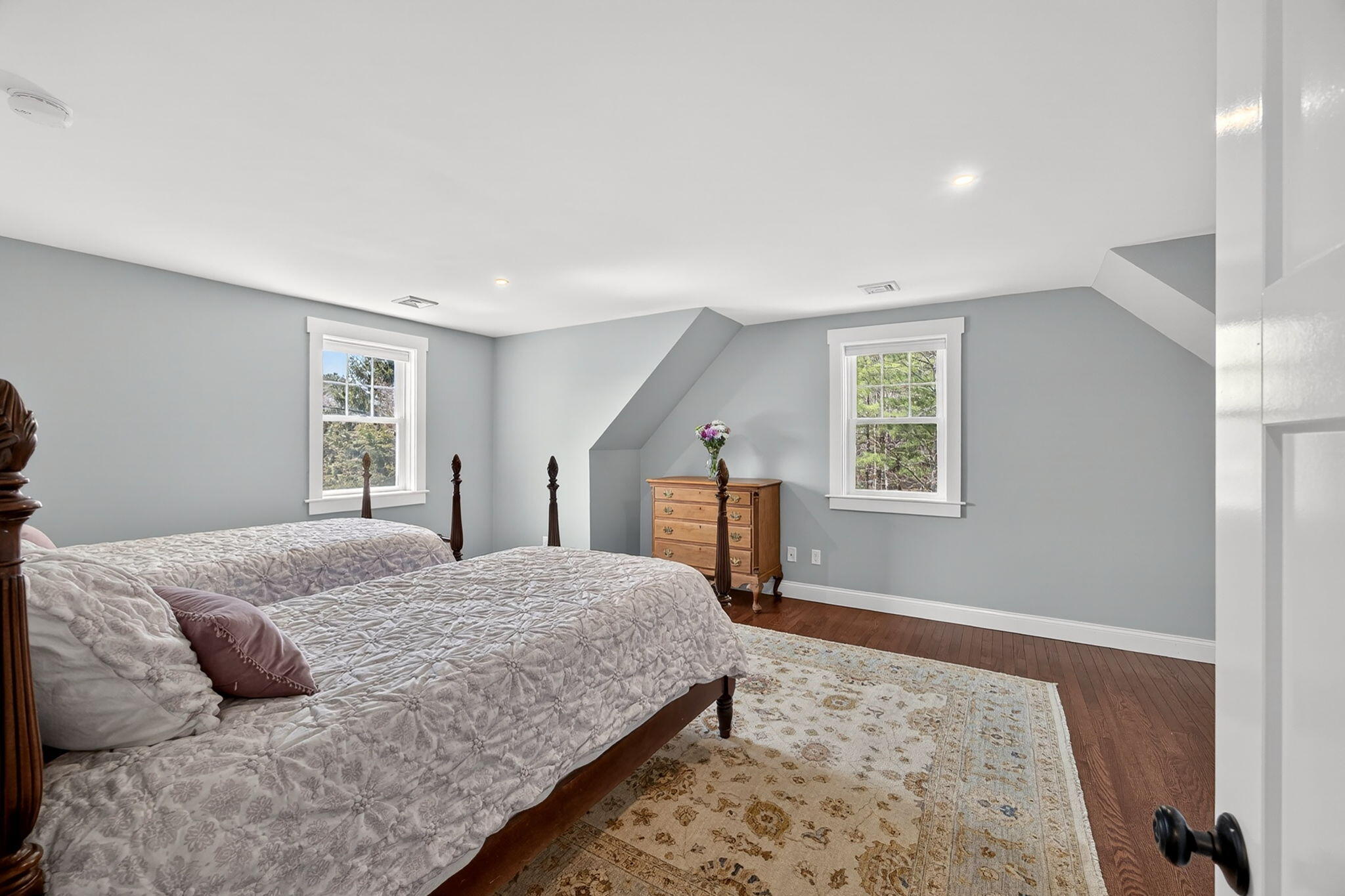 176 Bumps River Road Osterville, MA 02655 - Photo 36 of 54 a bedroom with a large bed and a window