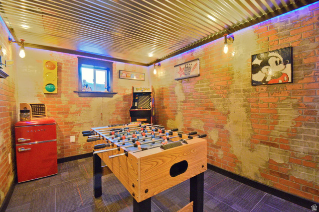 656 South Bullion Canyon Road Marysvale, UT 84750 - Photo 30 of 57 Game room with brick wall in basement