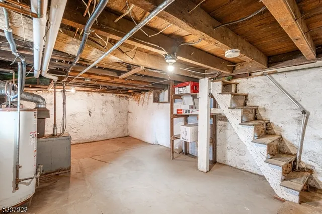 a view of a room with wooden walls