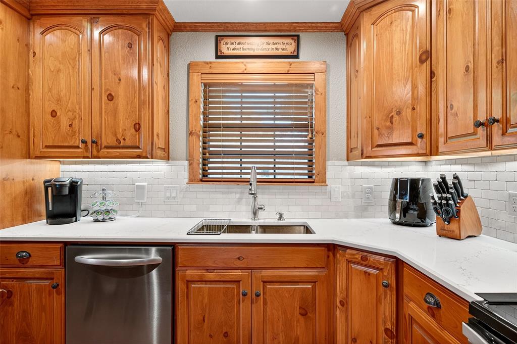 13631 Farm To Market Road 981 Blue Ridge, TX 75424 - Photo 13 of 40 a kitchen with a sink cabinets and window