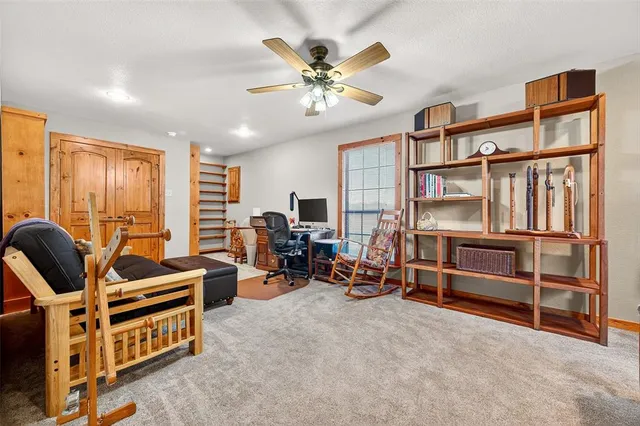 a room with furniture cabinets and window