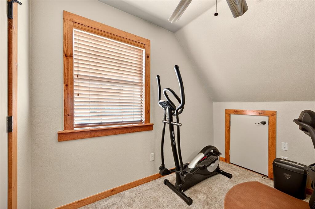 13631 Farm To Market Road 981 Blue Ridge, TX 75424 - Photo 24 of 40 a room with gym equipment and windows