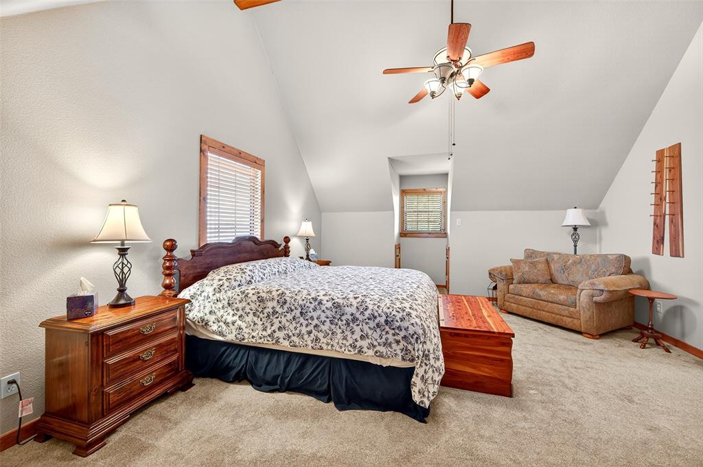 13631 Farm To Market Road 981 Blue Ridge, TX 75424 - Photo 28 of 40 a bedroom with bed and window