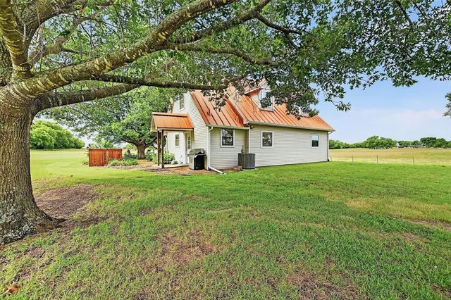 a house view with a garden space