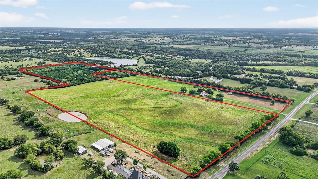 13631 Farm To Market Road 981 Blue Ridge, TX 75424 - Photo 39 of 40 an aerial view of residential houses with outdoor space and trees