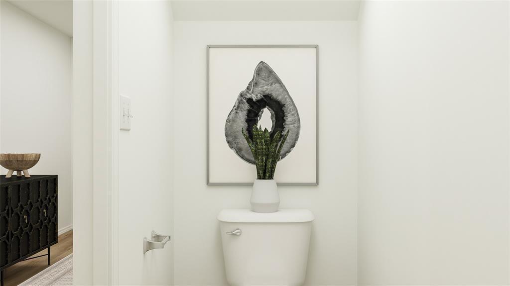 225 Ashbrook Street Little Elm, TX 75068 - Photo 1 of 1 Bathroom featuring wood finished floors and toilet