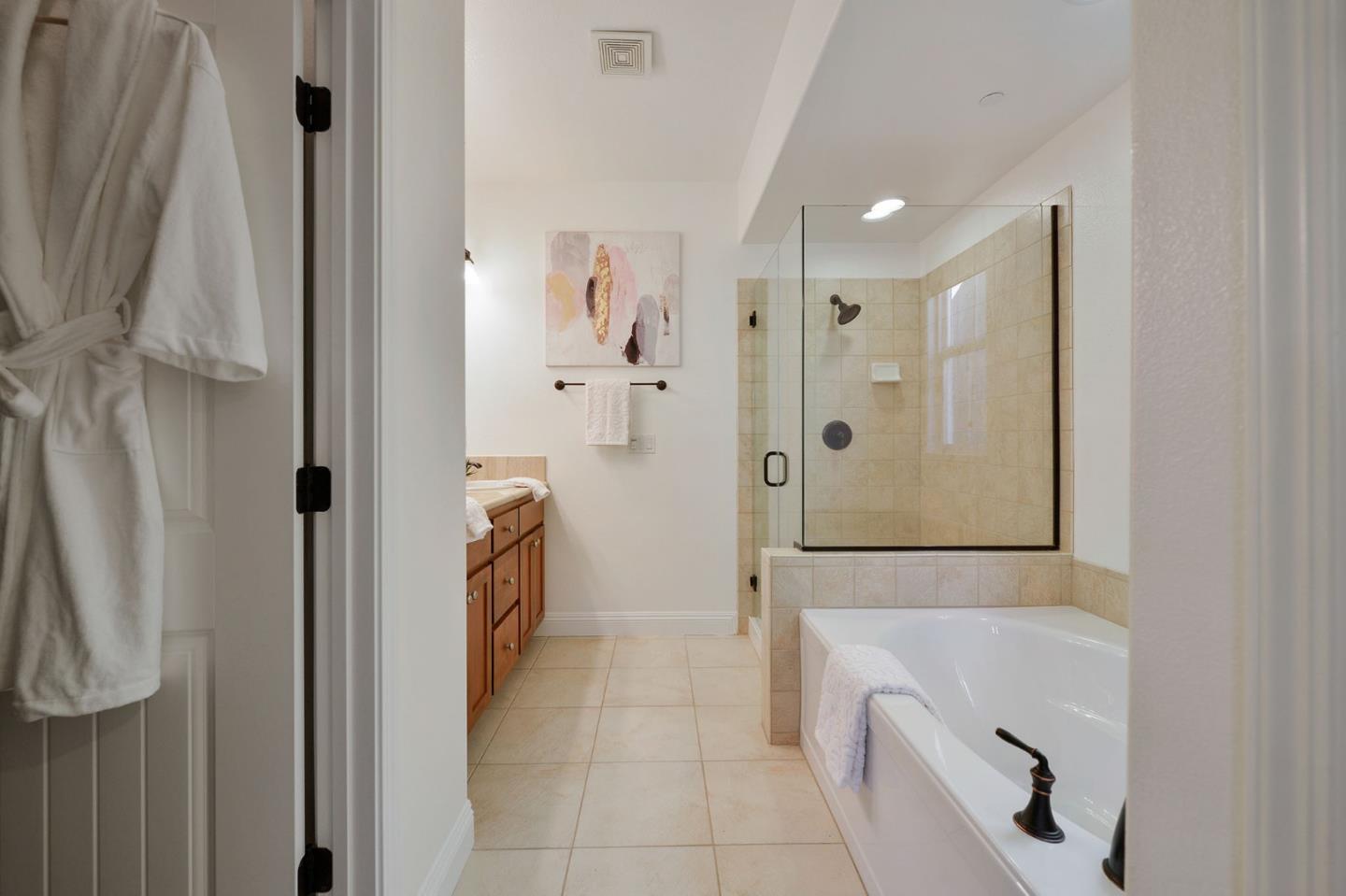 142 Azalea Drive Mountain View, CA 94041 - Photo 18 of 34 a bathroom with a tub shower and a sink