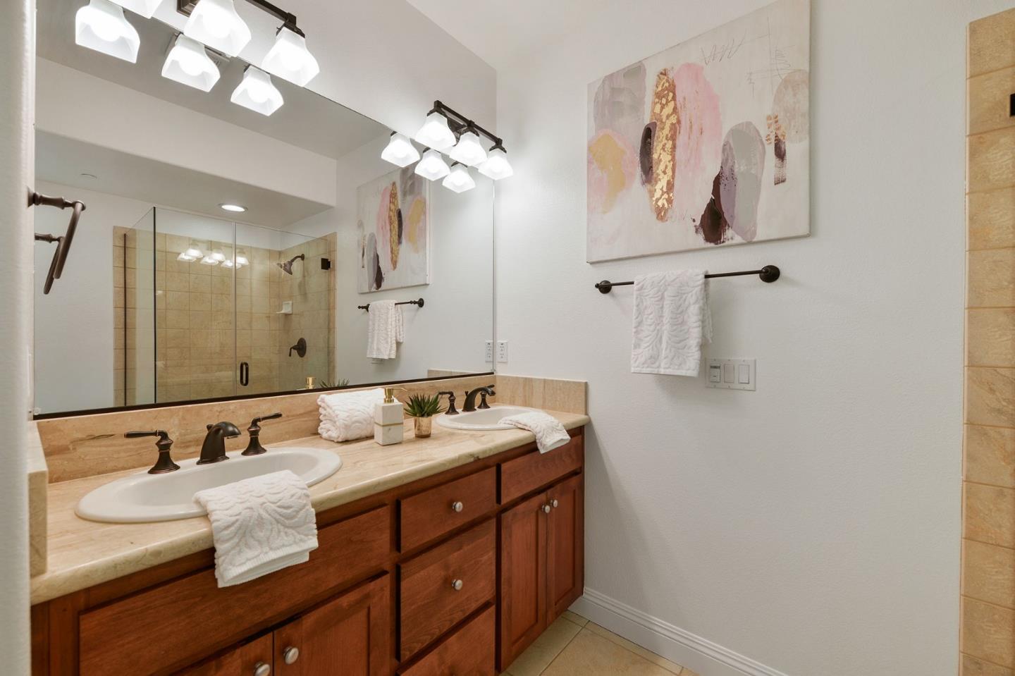 142 Azalea Drive Mountain View, CA 94041 - Photo 19 of 34 a bathroom with a sink and a mirror