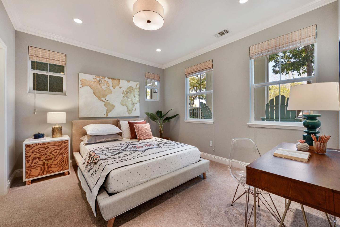 142 Azalea Drive Mountain View, CA 94041 - Photo 25 of 34 a bedroom with a bed and a table in it