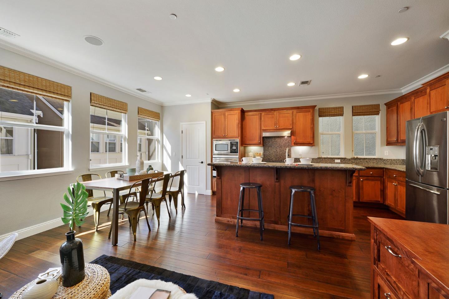 142 Azalea Drive Mountain View, CA 94041 - Photo 9 of 34 a dining room with furniture window and wooden floor