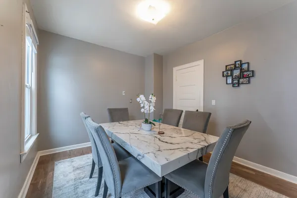 a view of a dining room with furniture
