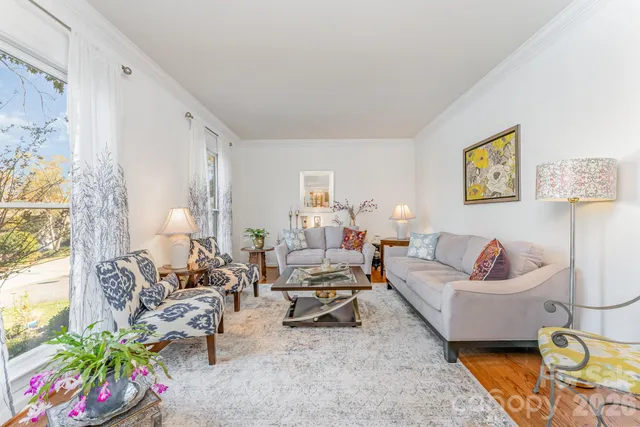 a living room with furniture and a couch