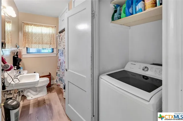 a storage room with a washer and dryer