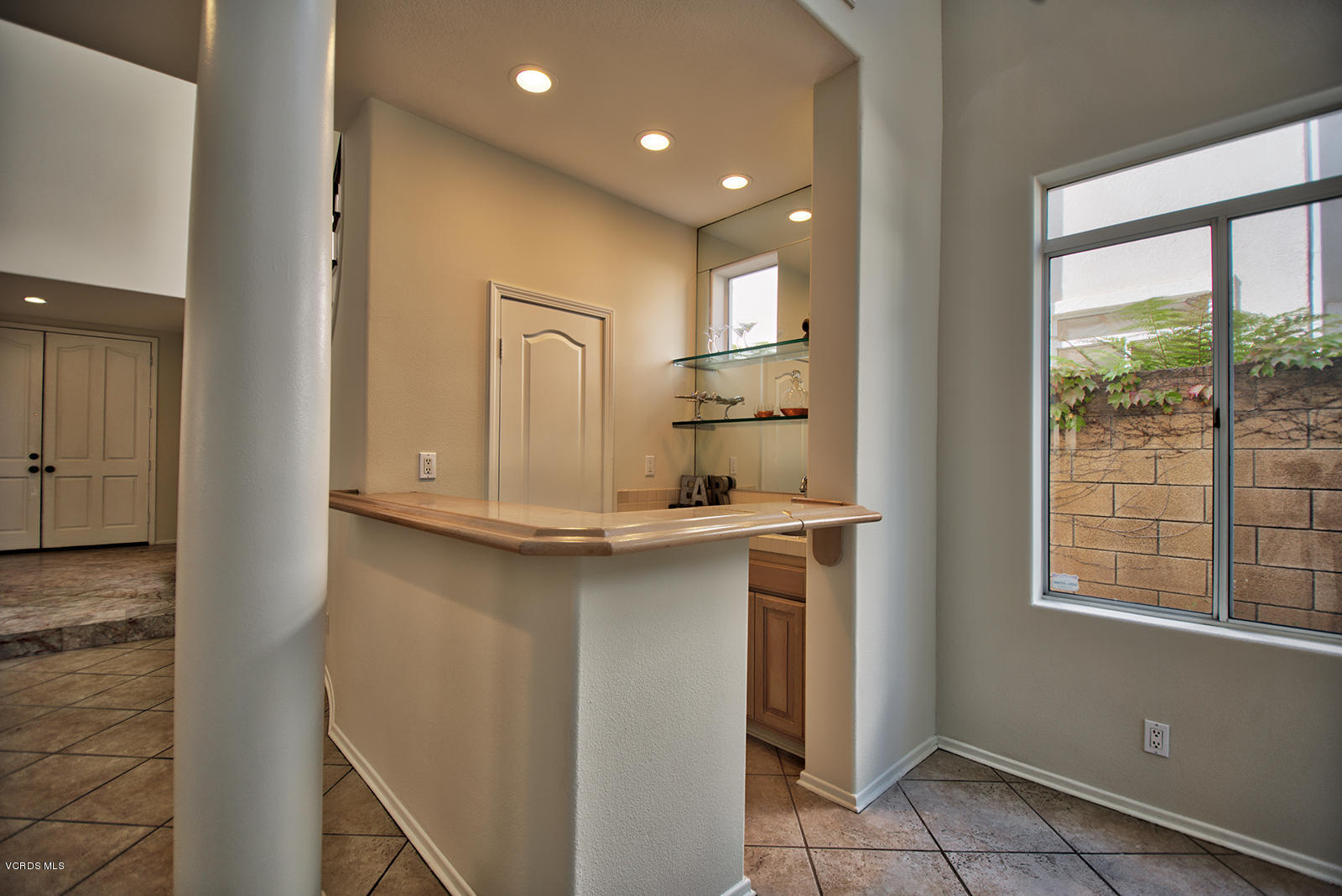 11651 Pinedale Road Moorpark, CA 93021 - Photo 4 of 43 a kitchen with stainless steel appliances granite countertop a refrigerator and a sink