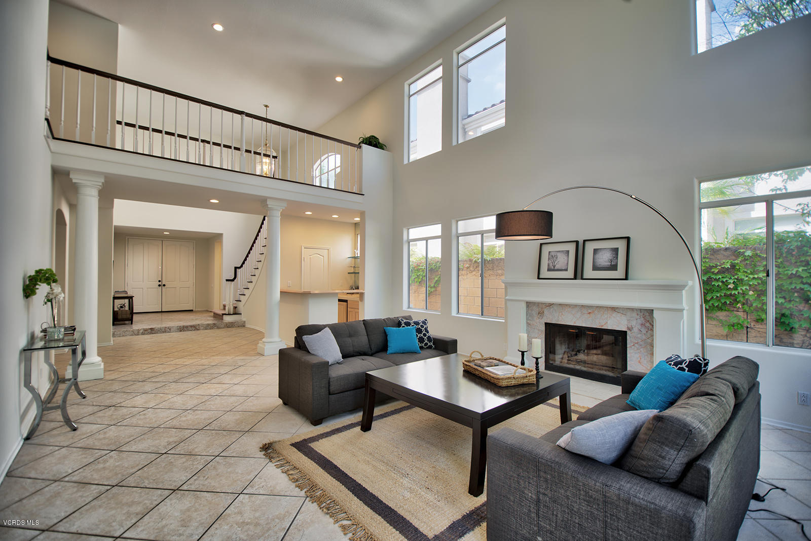 11651 Pinedale Road Moorpark, CA 93021 - Photo 5 of 43 a living room with furniture and a fireplace