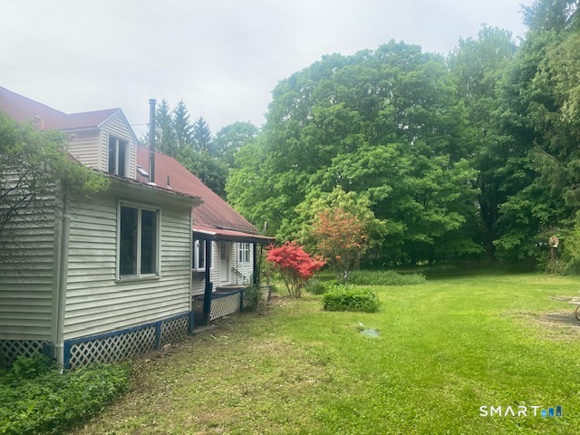 33 Flanders Road Bethlehem, CT 06751 - Photo 4 of 18 a view of a house with a yard