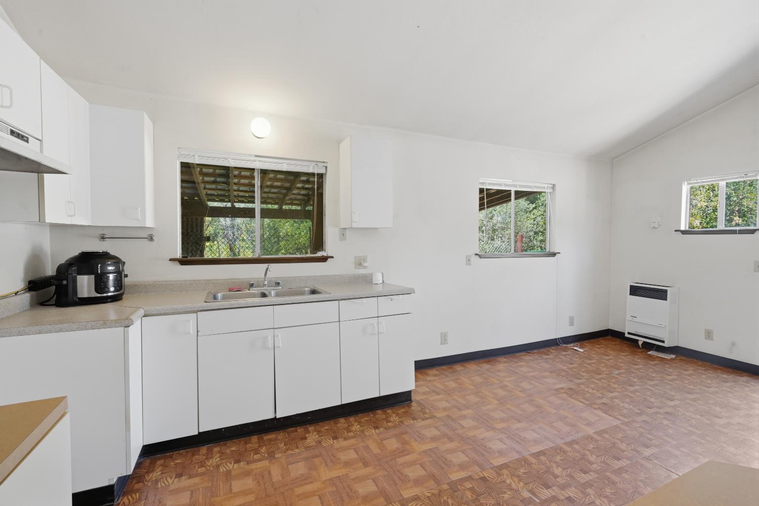 13351 Newtown Road Nevada City, CA 95959 - Photo 47 of 50 a kitchen with a sink and a window