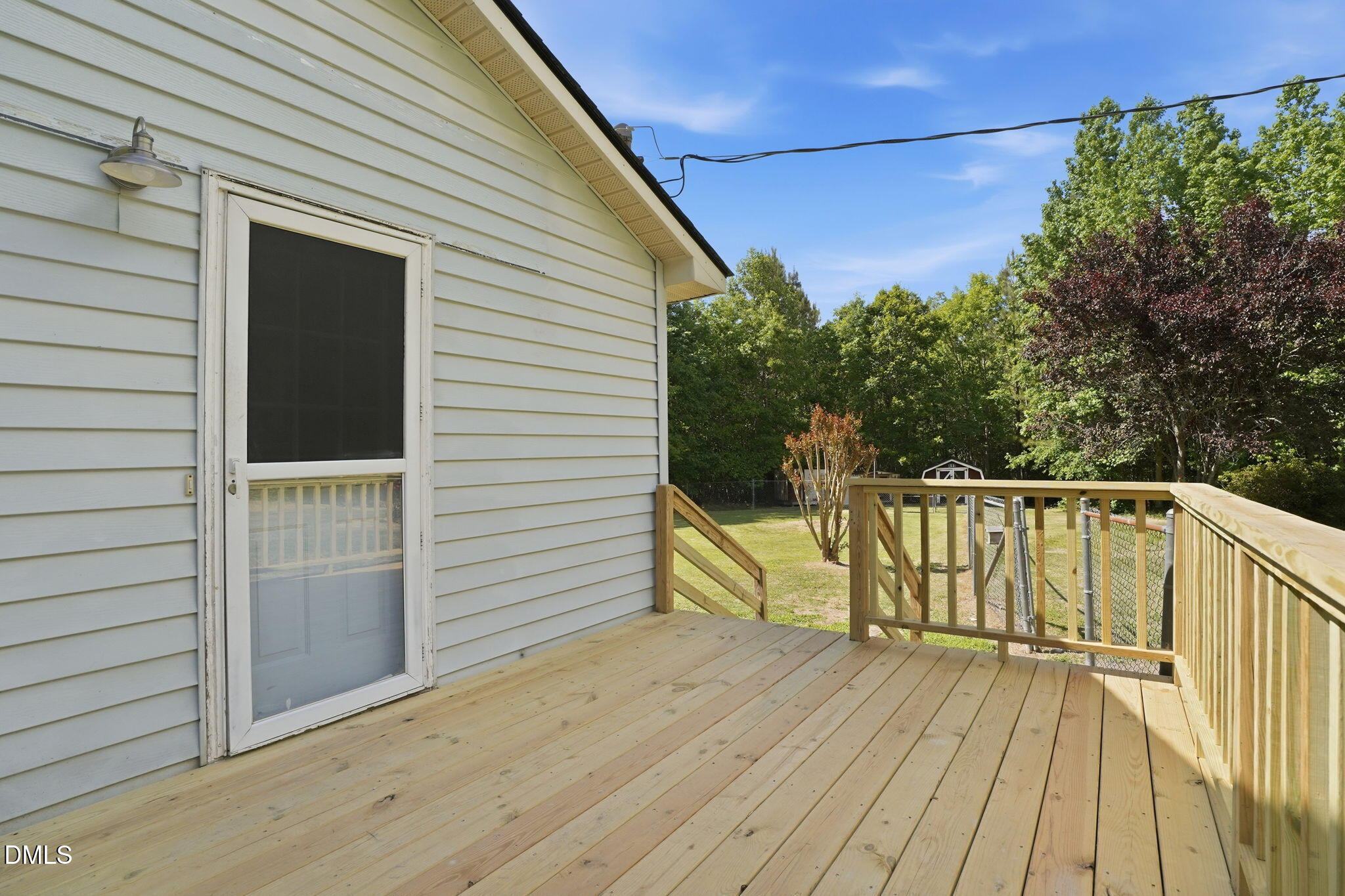3602 Harrison Road Castalia, NC 27816 - Photo 46 of 48 a view of balcony with wooden floor and seating space