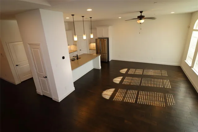 a view of a livingroom with furniture and wooden floor