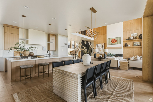 923 North Emery Lane Elk Ridge, UT 84651 - Photo 22 of 101 Expansive open-concept living area featuring a light wood-finish flooring throughout