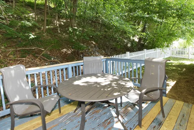 a view of a deck in a backyard