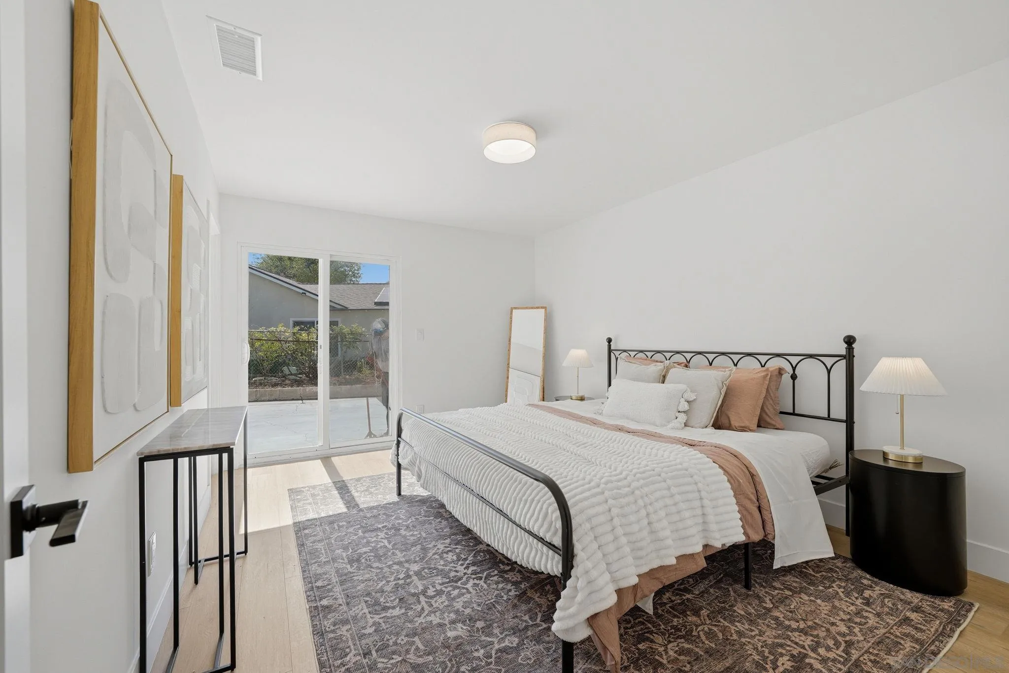 10440 Bosque Drive Lakeside, CA 92040 - Photo 33 of 47 a large bed sitting in a bedroom next to a window