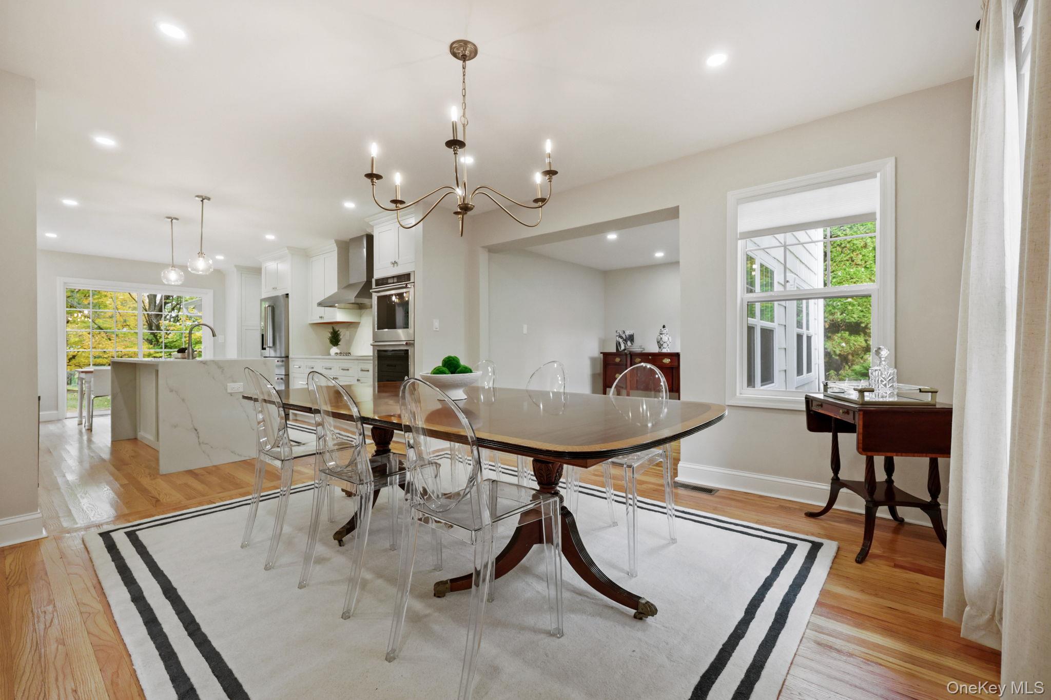 790 Hardscrabble Road Chappaqua, NY 10514 - Photo 11 of 40 Dining room with a chandelier, light wood finished floors, and recessed lighting