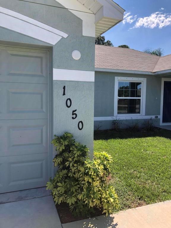 1050 Southwest McCall Road Port St. Lucie, FL 34953 - Photo 5 of 41 a view of a backyard