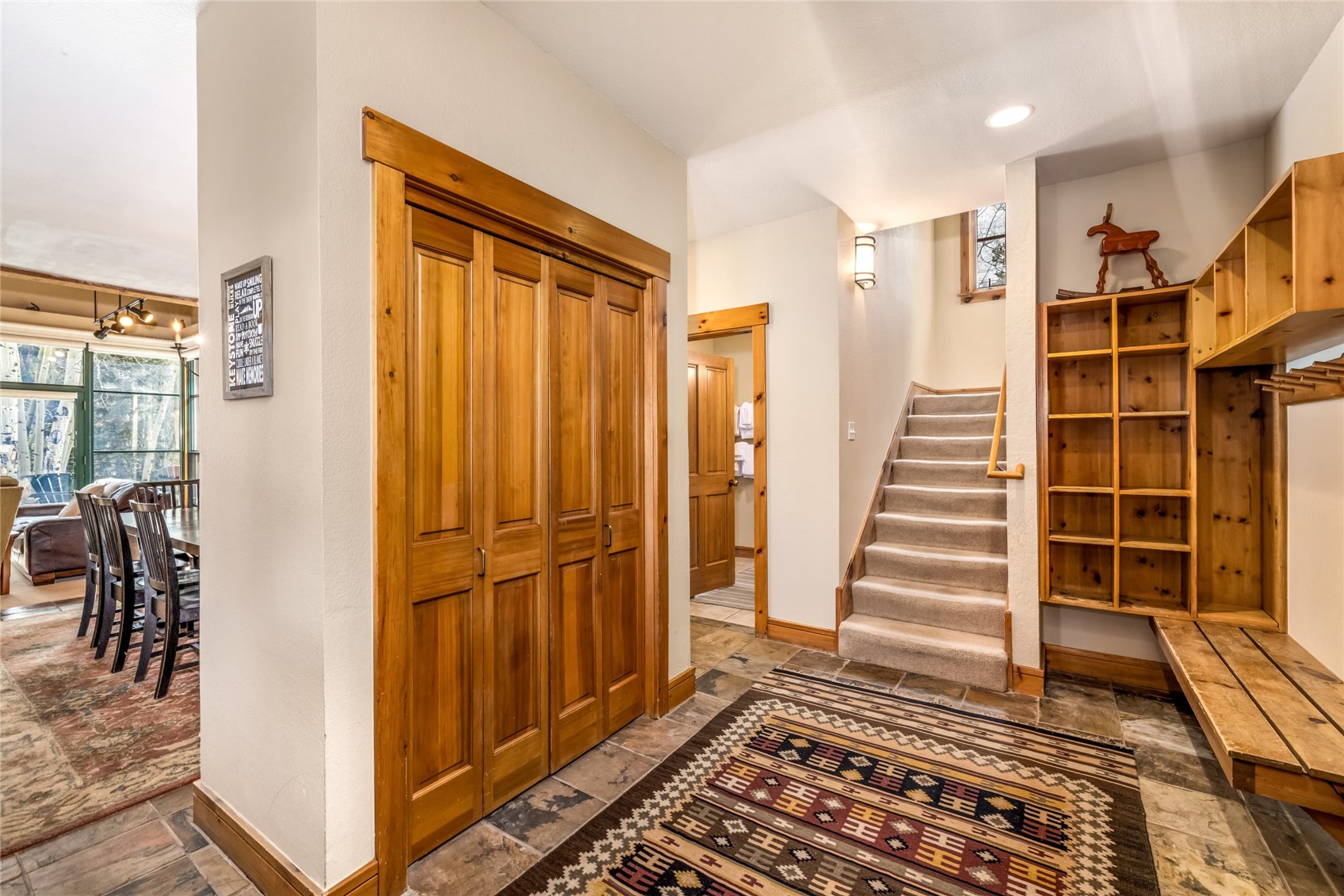 720 Alhambra Road, Unit 8741 Keystone, CO 80435 - Photo 30 of 49 a view of a livingroom with wooden floor and furniture