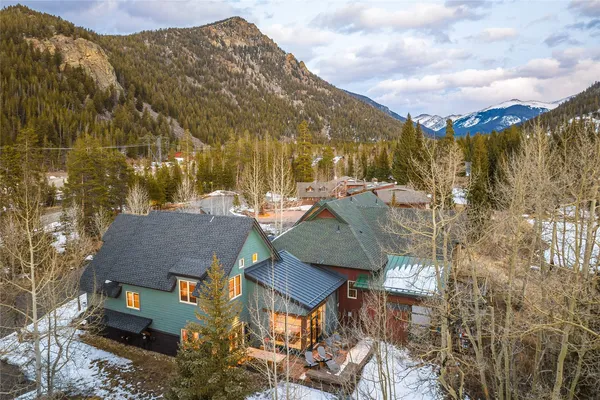 a view of houses with outdoor space and street view