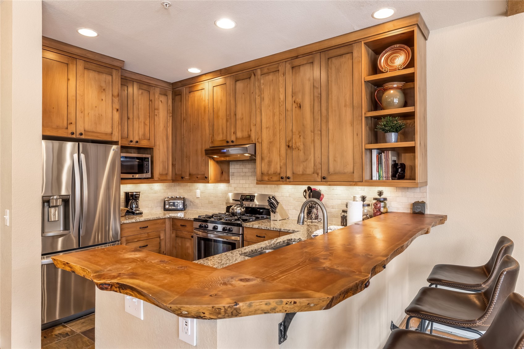 720 Alhambra Road, Unit 8741 Keystone, CO 80435 - Photo 8 of 49 a kitchen with stainless steel appliances granite countertop a sink and dishwasher