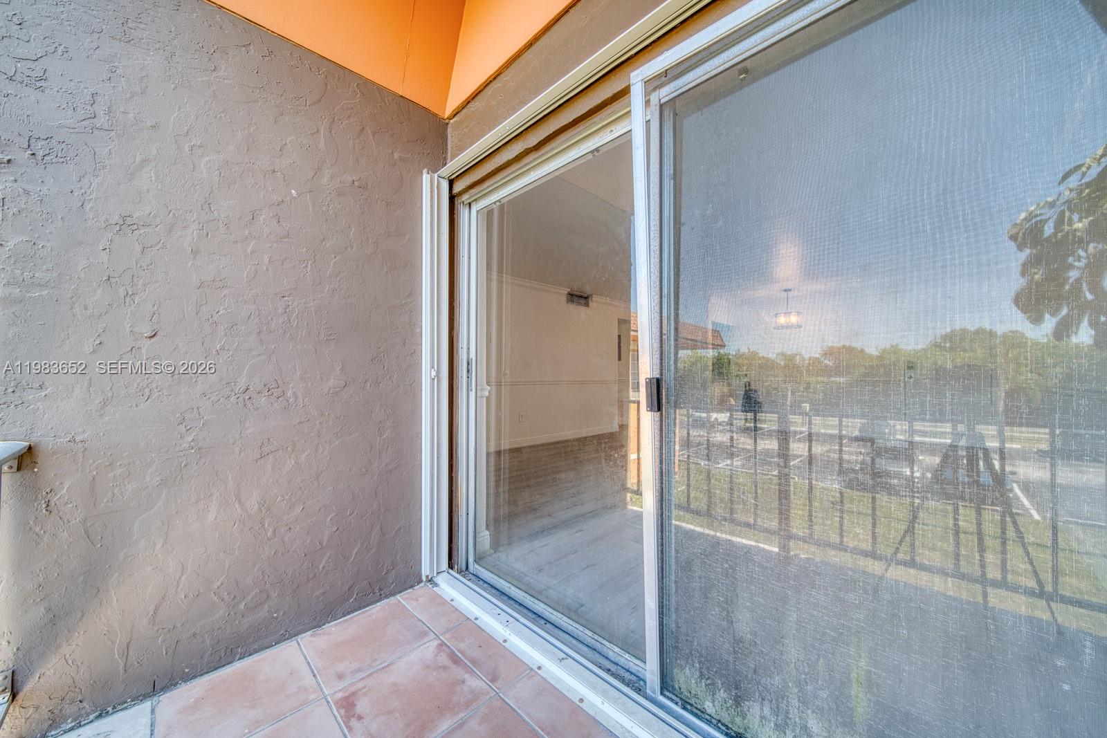 9459 Southwest 76th Street, Unit R5 Miami, FL 33173 - Photo 22 of 33 a view of a balcony