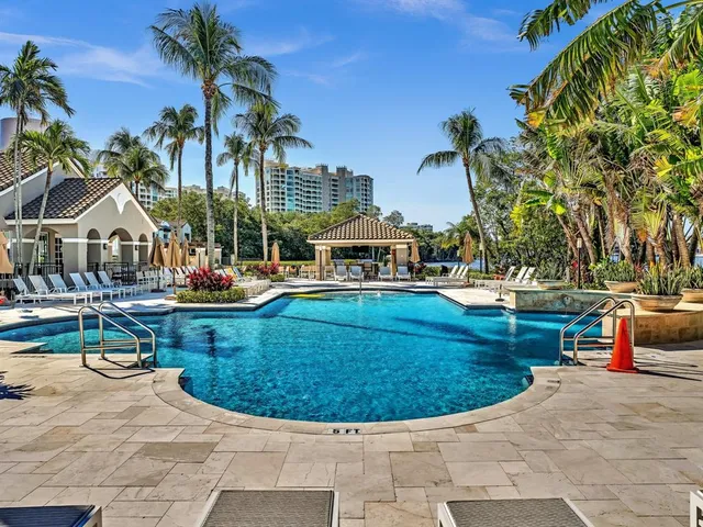 a view of a chairs and table in the patio
