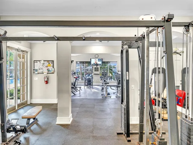 a view of a livingroom with workspace and a couch