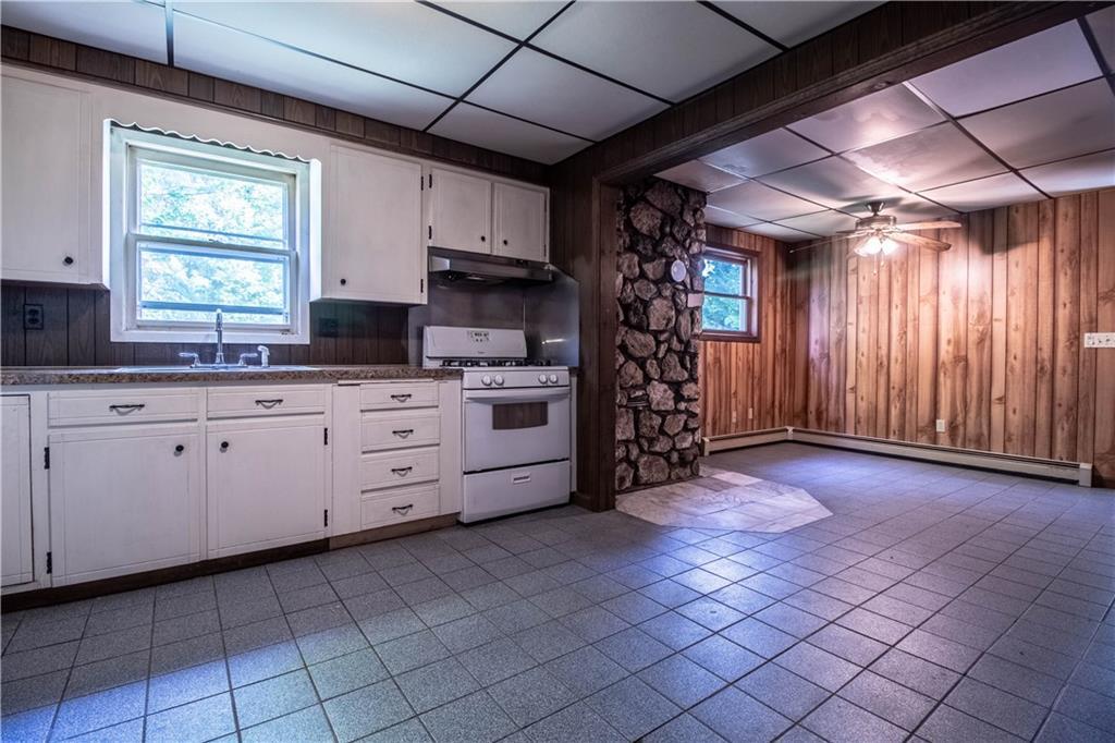 106 Robinson Hill Road Sebago, ME 04029 - Photo 16 of 34 Tiled dining area, kitchen, with...