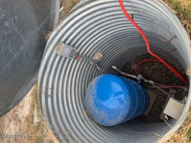 3445 Artemisia Road Winnemucca, NV 89445 - Photo 13 of 14 a view of a fireplace with wooden floor