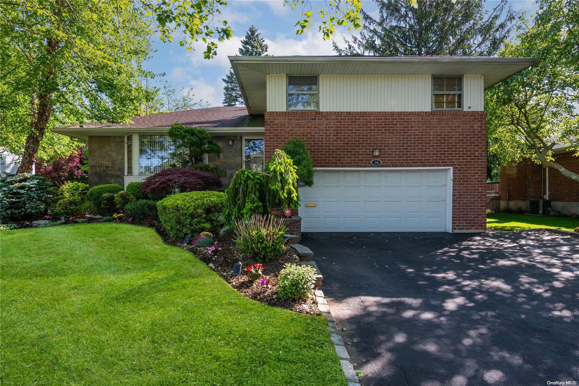 a view of a house with a garden