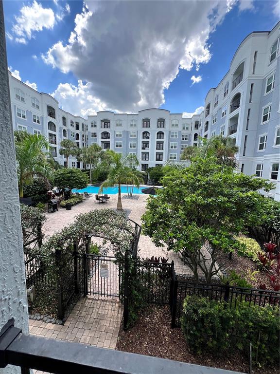 206 East South Street, Unit 2063 Orlando, FL 32801 - Photo 2 of 7 a view of a building with garden and sitting area