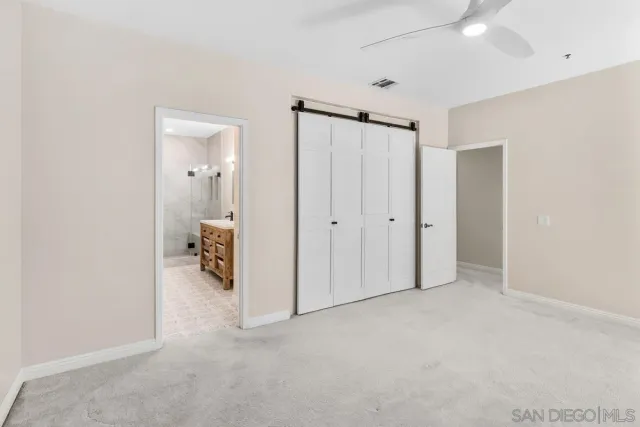 a bathroom with a sink double vanity and a shower