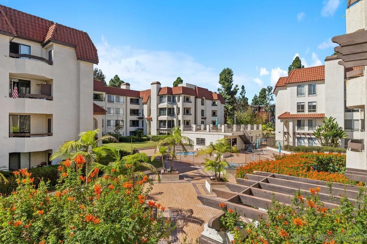 5845 Friars Road, Unit 1201 San Diego, CA 92110 - Photo 36 of 43 a view of multiple houses with a yard