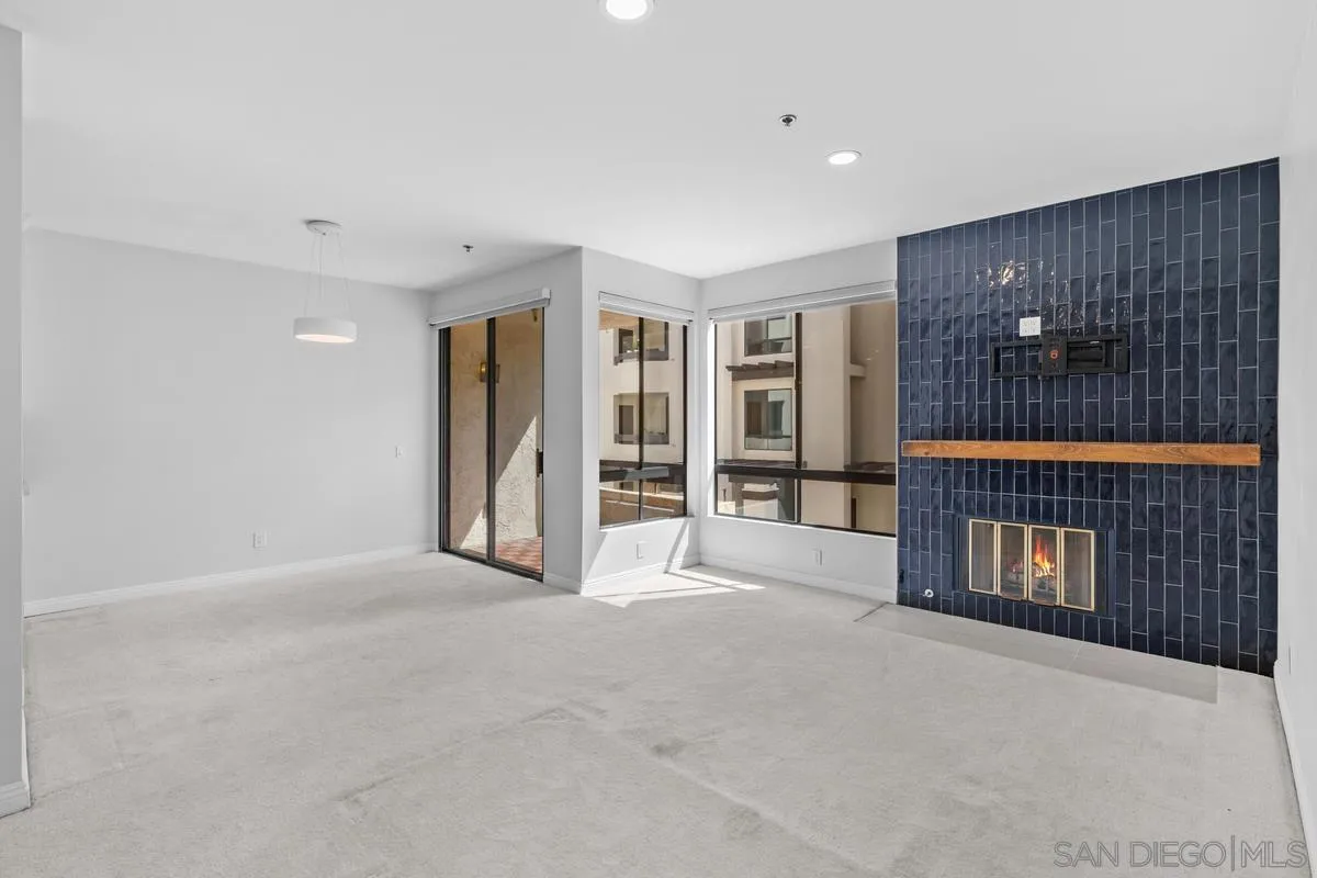 5845 Friars Road, Unit 1201 San Diego, CA 92110 - Photo 4 of 43 a view of an empty room with closet