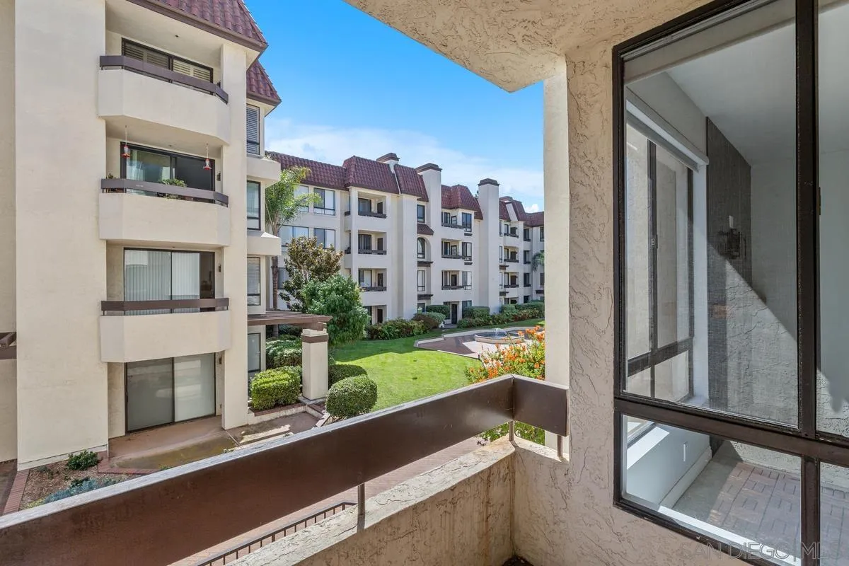 5845 Friars Road, Unit 1201 San Diego, CA 92110 - Photo 5 of 43 a view of balcony with a flat screen tv and a floor to ceiling window