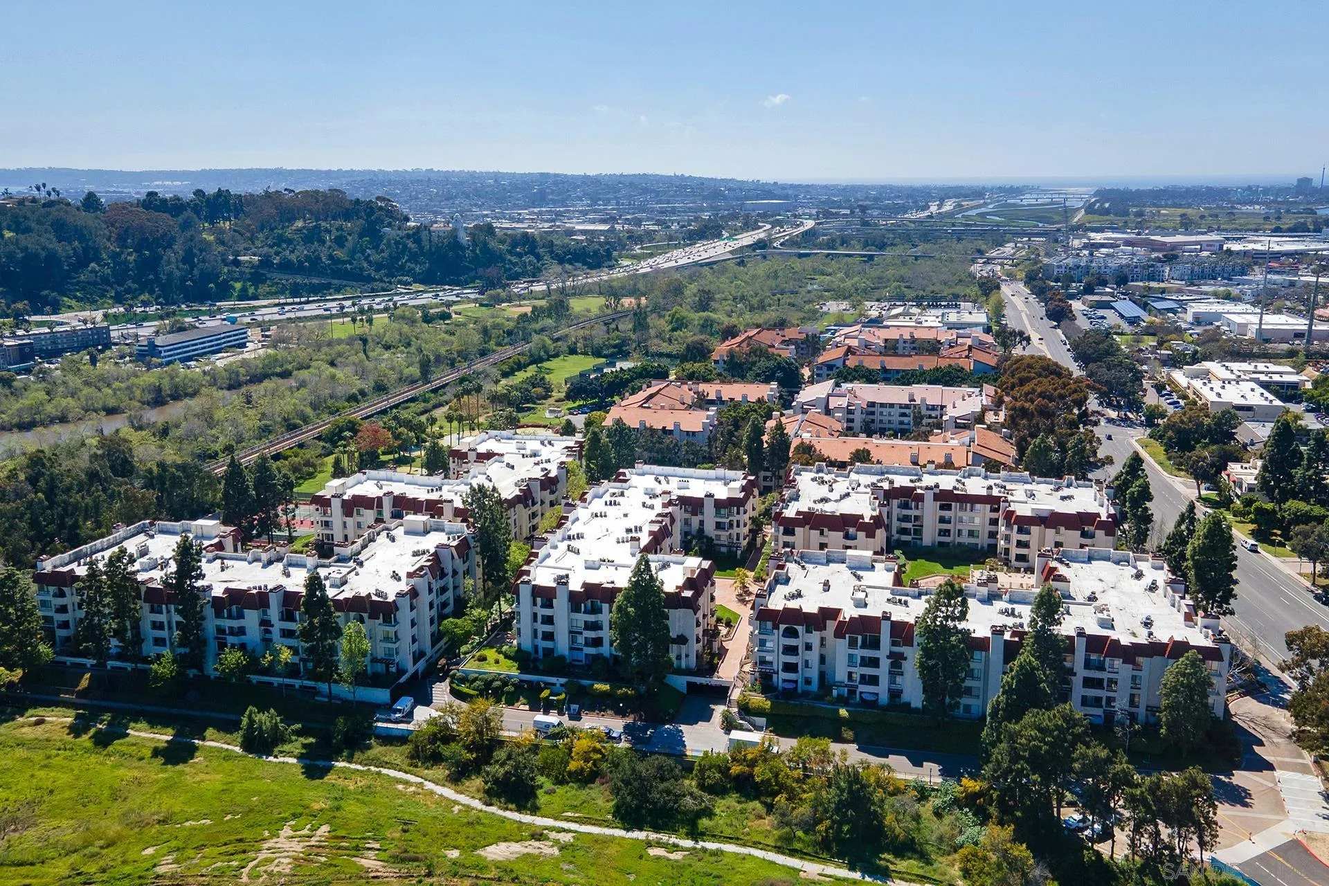 5845 Friars Road, Unit 1201 San Diego, CA 92110 - Photo 8 of 43 an aerial view of residential houses and outdoor space