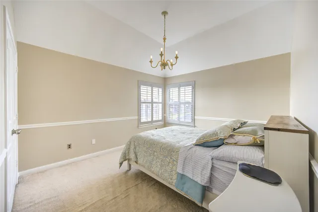 a view of a livingroom with furniture and windows